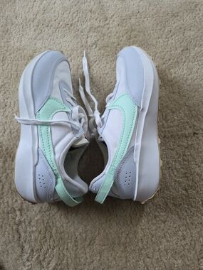 Nike White Sneakers with Mint Green Swoosh